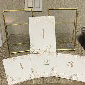 Set of 2 gold easel back frames 5 x 7,  and 4 table numbers